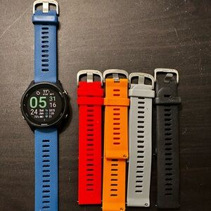 Garmin Forerunner 255 Music with Blue, Red, Orange, Gray, and Black Bands